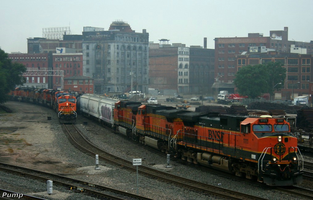 Northbound BNSF Mixed Freight Train Passing a Stopped Northbound BNSF Empty Coal Train